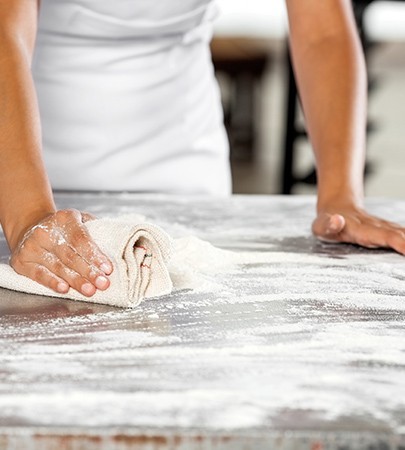 Cleaning a bakery worktop