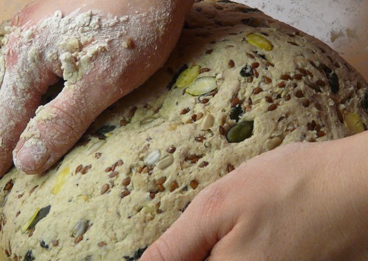 kneading sourdough