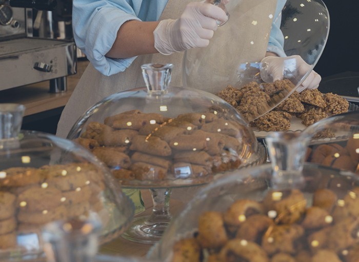 cafe with baked goods display listing